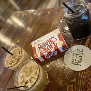 two drinks and a box of movie popcorn