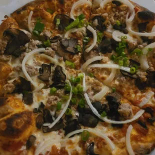 Sausage and mushroom pizza. Crust was amazing. Served hot and fresh