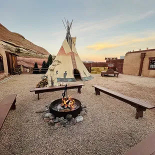 a teepee with a fire in it