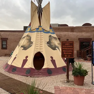 a teepee in a courtyard