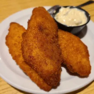 Fridays special is all you can eat walleye. This is my second helping. Came with salad, potato option, and a roll. Fish was good and hot.