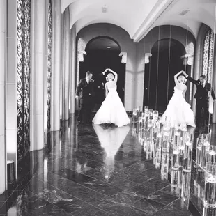 Mirrored hallway with floating candles