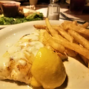 Haddock with fries and a lemon butter, which looked like cheese. It was not good.