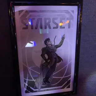 a poster of a man in a suit