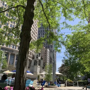 a fountain in the middle of the city
