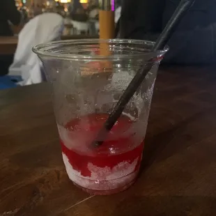 a drink in a glass with a straw