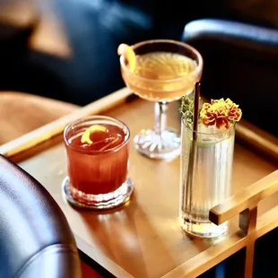 two cocktails on a tray