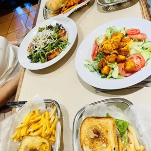 Veggy patty melt, spicy chicken salad, Asian salmon salad, cheeseburger &amp; chicken sandwich with sweet potatoes fries