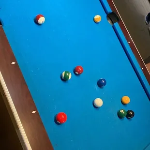 a pool table with balls on it