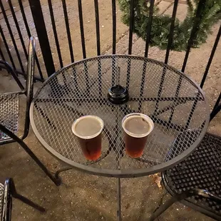 two cups of beer on a table