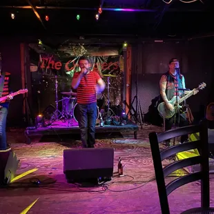 a band performing on stage