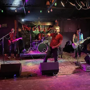 a band performing on stage