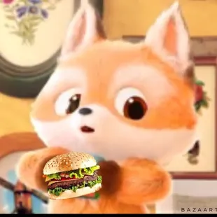 a stuffed animal holding a hamburger