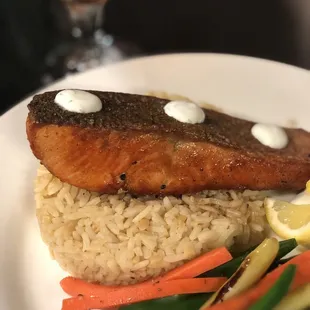 a plate of food with rice and vegetables