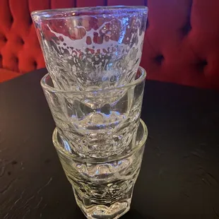 a stack of glasses on a table