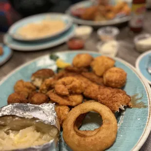 Seafood platter enough for several people. All perfectly cooked w light breading.