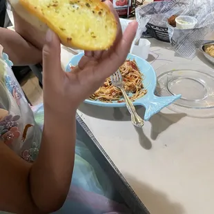 Kids spaghetti and garlic bread