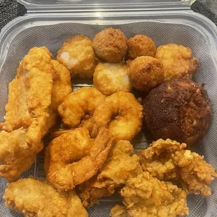 Fried seafood dinner (haddock, shrimp, crab cake, scallops, oysters and hush puppies)