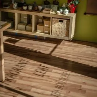 a kitchen with green walls