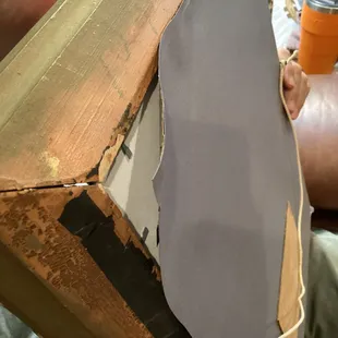 This was not even tacked down cause the old pieces of paper where still attached, you can see that it tried to tack it on top of old paper.