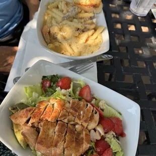 Steak shrimp pasta and strawberry chicken salad. Eggplant appetizer was delish and very shareable