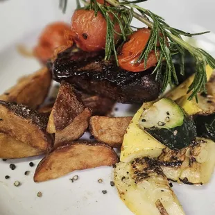 a plate of food with vegetables