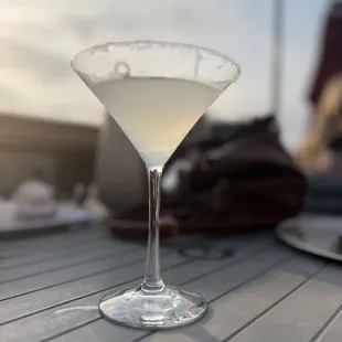 a martini glass on a table