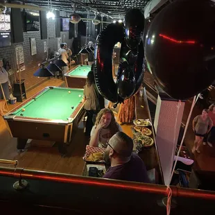Lower level with two tables and the pool table use at no extra charge!
