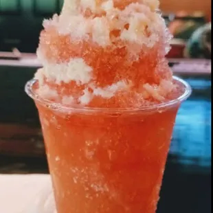 The famous Bourbon Peach Cobbler with your choice of bourbon