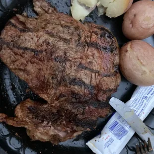 Steak and boiled potatoes.