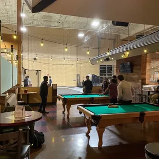 people playing pool