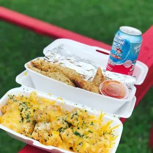 Chicken Alfredo fries, boudin egg rolls, and a Hawaiian