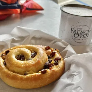 Raisin brioche and a latte.