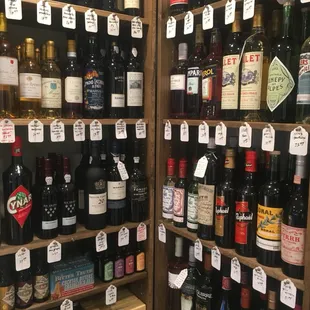 a shelf full of wine bottles