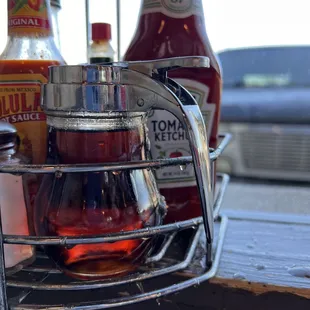 Dried syrup on the condiment holder