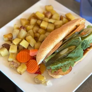 Shrimp po'boy with fried potatoes