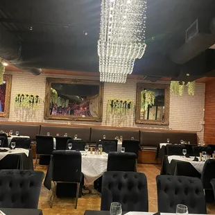 a dining room with a chandelier