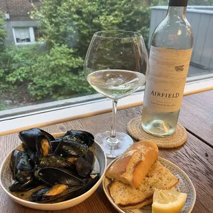 Mussels and wine from their store