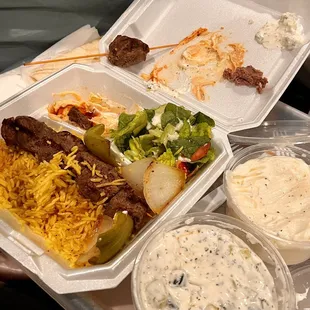 Filet Skewer plate (2 skewers, rice, salad, hummus and pita with a la cart Vegetable Skewer, with Garlic Sauce/Paste and Tzatziki.