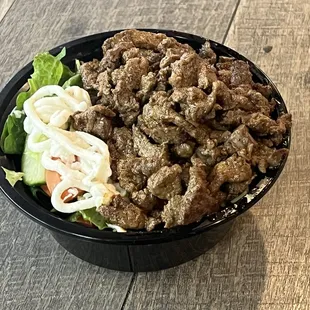 a bowl of meat and vegetables