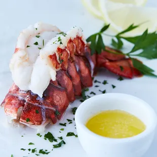 a lobster with lemon and parsley