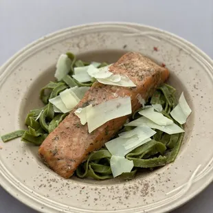 Friday salmon deal with fresh spinach fettuccine and Parmigiano Reggiano.