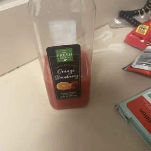 The orange strawberry juice I bought from the fresh market
