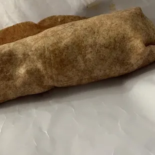Buffalo chicken wrap. Didn&apos;t cut it I asked for American cheese with my blue cheese on it got no cheese at all