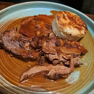 Pork roulade (roulade is fig, olive and almonds) and a sheep&apos;s milk potato gratin