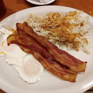 Two Egg Combo. Eggs over med, bacon, hash browns and toast.