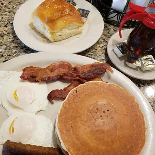 Pancake Platter and a biscuit. Excellent bacon AND sausage