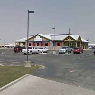 a parking lot with cars parked in it