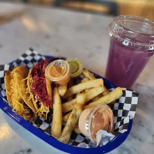 a plate of fries and a drink