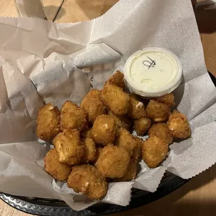 a basket of fried tater tots